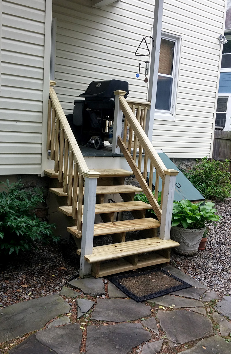 Exterior wooden stairs for home entry